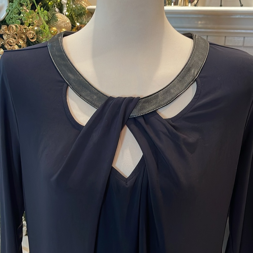 Large top with faux leather trim